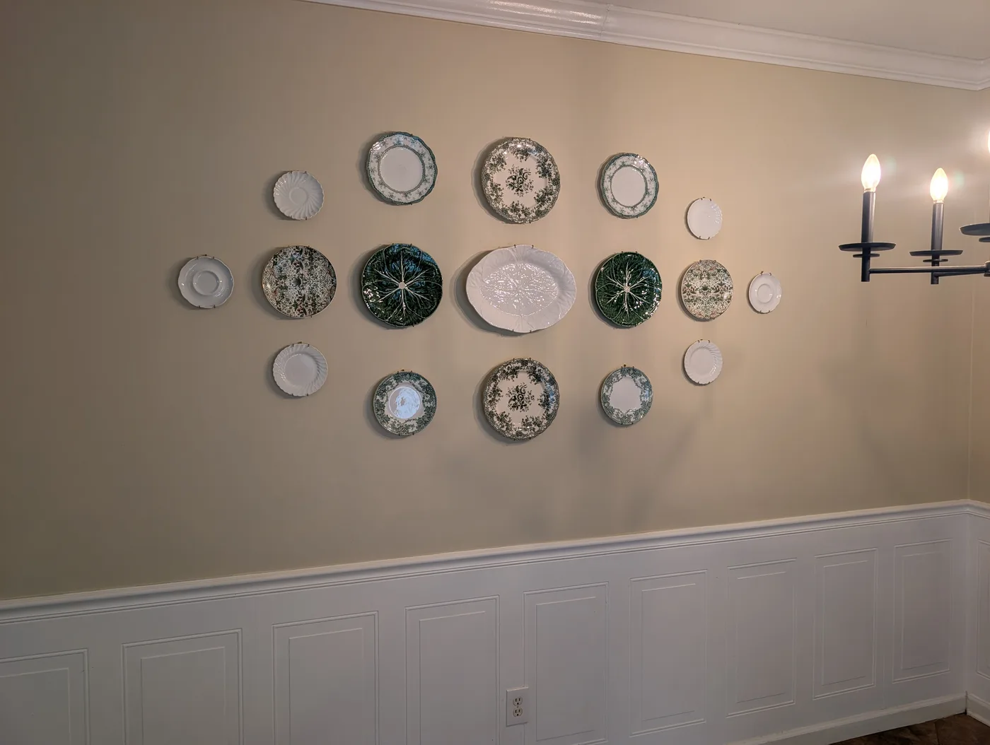 Decorative plates mounted on a wall by Frye Inc.